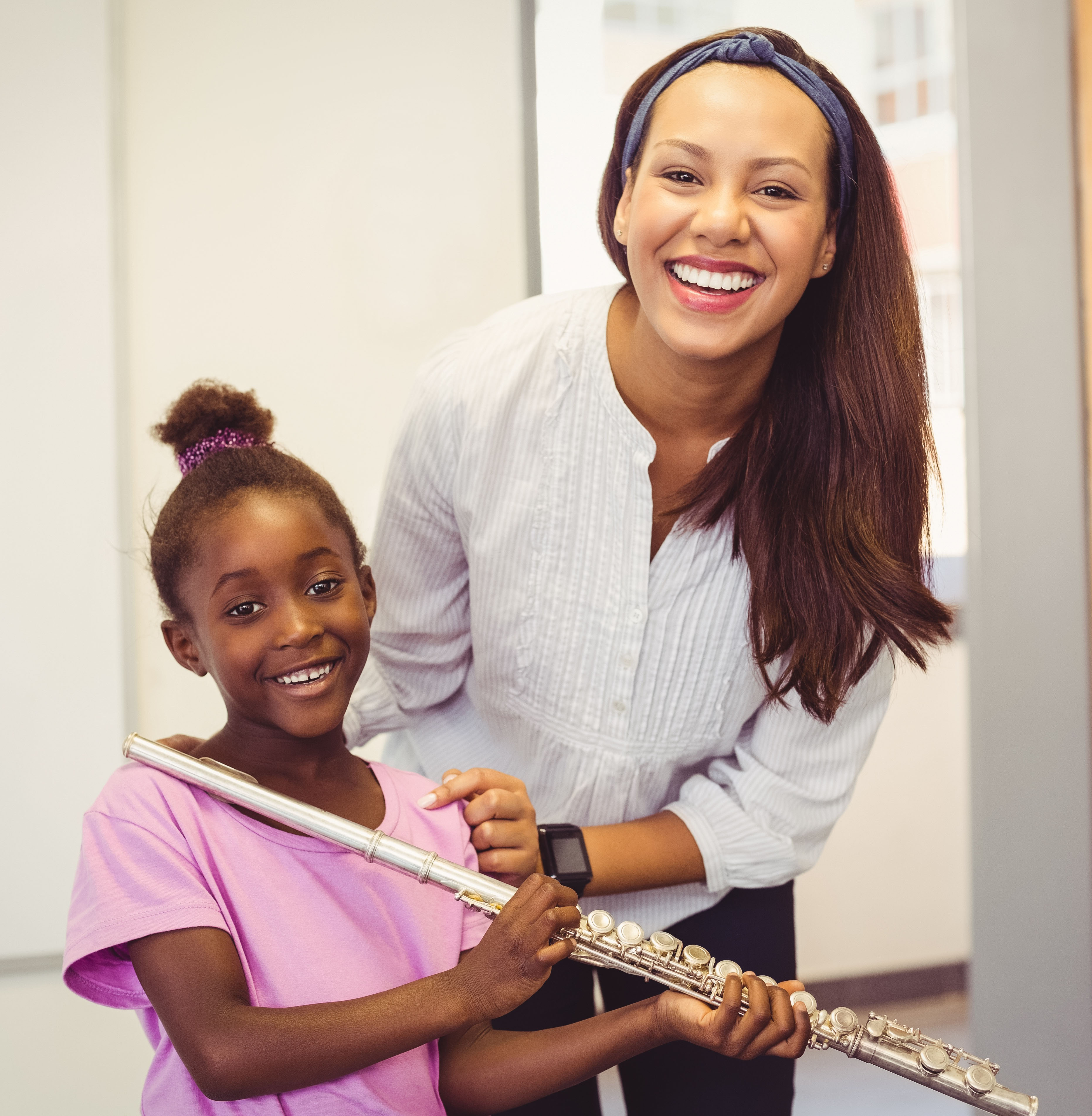 Mom and daughter with flute